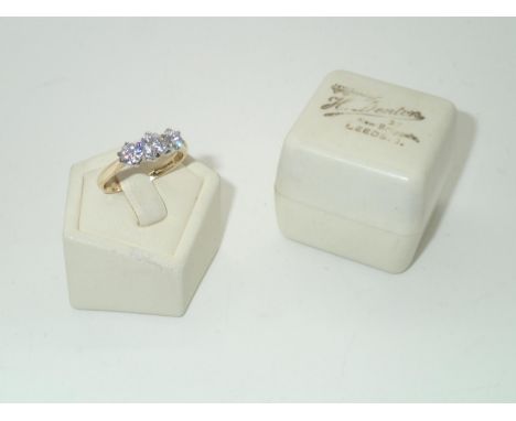 18ct gold three stone moissanite ring, size M, 2.9gP&P group 1 (£16 for the first item and £1.50 for subsequent items) 