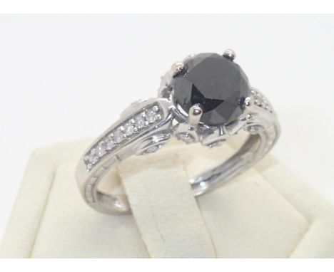 9ct white gold large black diamond solitaire ring with diamond set shoulders, size K, 2.7g diamond tested as suchP&P group 1 