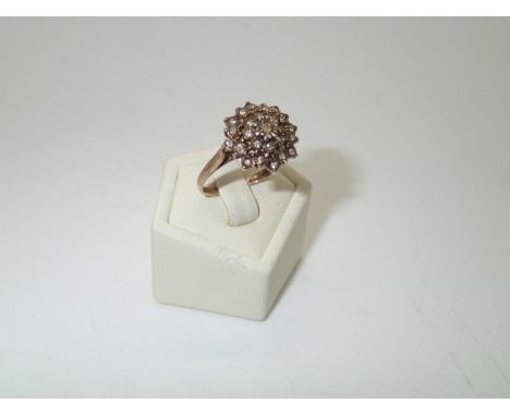 Vintage 9ct gold diamond flower head cluster ring, size O, 3.2gP&P group 1 (£16 for the first item and £1.50 for subsequent i