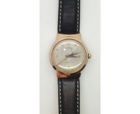 Vintage gents gold plated Roamer wristwatch on a leather strap. Working at lotting upP&P group 1 (£16 for the first item and 