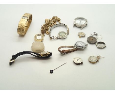 Quantity of wristwatch parts including mechanical movementsP&P group 1 (£16 for the first item and £1.50 for subsequent items