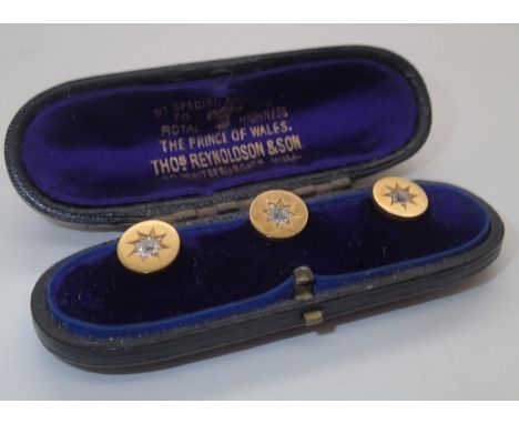 Boxed set of three Victorian gold collar studs, each set with an old cut diamond. Tests as 18ct. 3.8g total weight diamond di