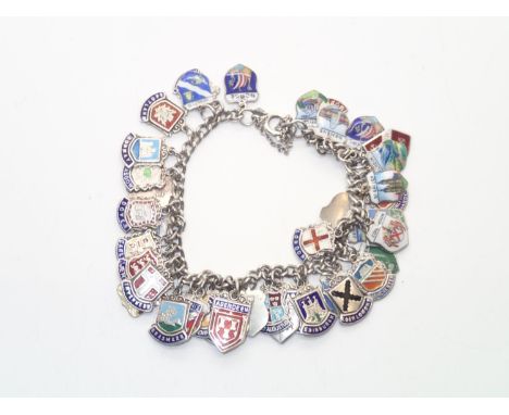 Vintage Silver Charm Bracelet with 43 silver and enamel city/town shields 64gP&P group 1 (£16 for the first item and £1.50 fo