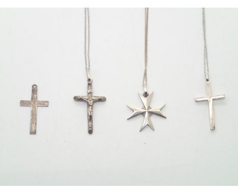 Four silver crosses on three silver chainsP&P group 1 (£16 for the first item and £1.50 for subsequent items) 