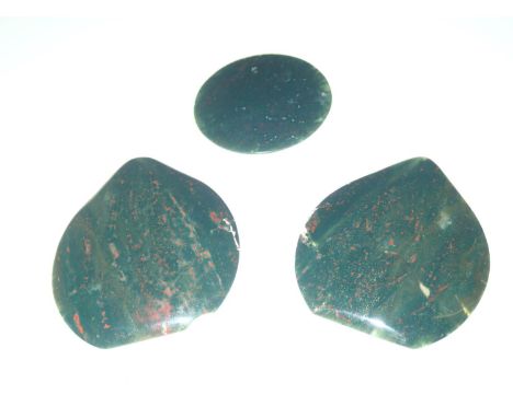 Loose gemstones: three large bloodstone panels, largest 69.9mm x 59.6mm gross weight 68.2gPlease note gemstones listed have b