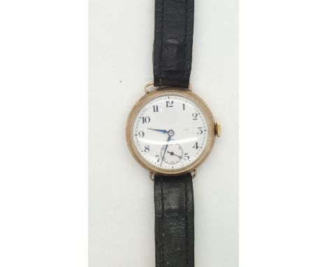 Gents Zenith 9ct gold trench wristwatch on a leather strap, screw back, movement number 2385683. Case diameter 32 mm Working 