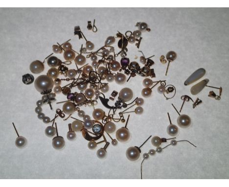 Various pearl pairs and single earrings, mostly mounted in 9ct gold Largest pearl D: 11 mm gross weight 38.2 gP&P group 1 (£1