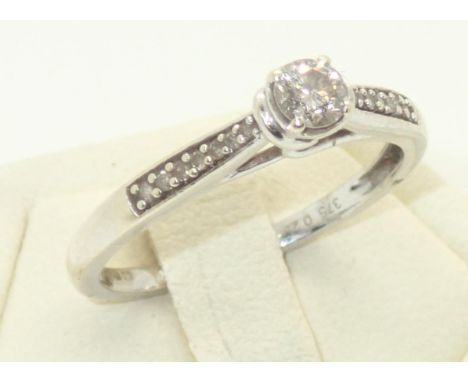 9ct white gold diamond engagement ring, with diamond shoulders, size M, 1.8gP&P group 1 (£16 for the first item and £1.50 for