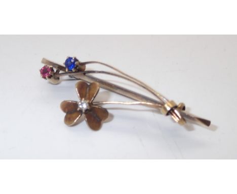 15ct flower head brooch set with diamond, sapphire and ruby, 3.8gP&P group 1 (£16 for the first item and £1.50 for subsequent