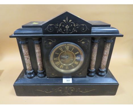 A VINTAGE SLATE MANTEL CLOCK WITH COLUMN DETAIL 