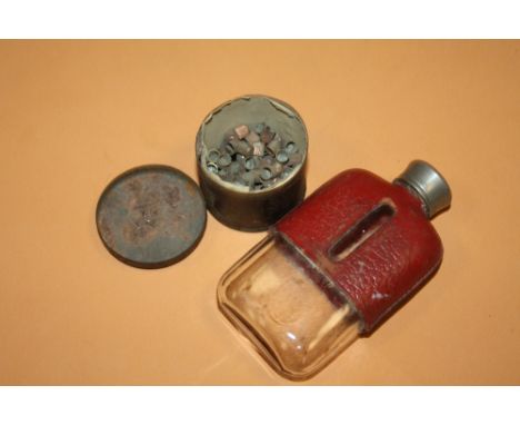 A TIN OF EARLY AIR RIFLE PELLETS TOGETHER A SMALL LEATHER COATED HIP FLASK