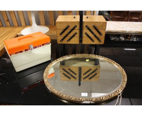 A VINTAGE GILT FRAMED OVAL WALL MIRROR W-65 CM WITH TWO SEWING BOXES AND CONTENTS (3)