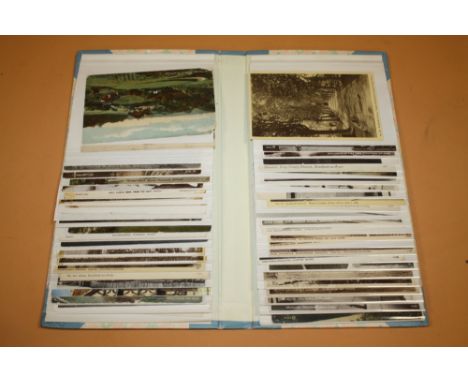 AN ALBUM OF VINTAGE AND ANTIQUE POSTCARDS
