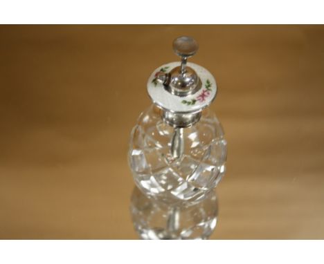 A SILVER AND ENAMEL MOUNTED PERFUME BOTTLE