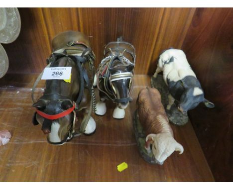 TWO CERAMIC SHIRE HORSE FIGURES' TOGETHER WITH TWO BULL FIGURES (4) 