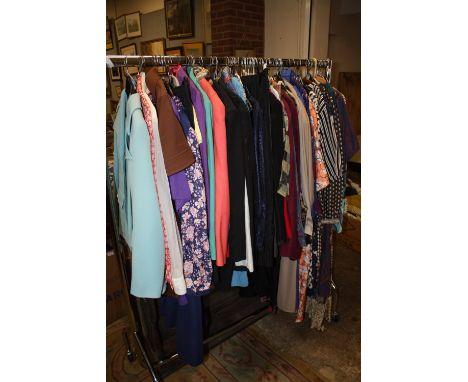 A RAIL OF LADIES VINTAGE CLOTHING' VARIOUS STYLES AND PERIODS TO INC 1970S AND 1980S ETC (APPROX 55) - RAIL NOT INCLUDED