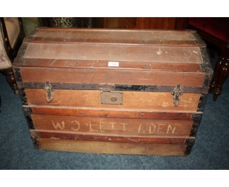 A VINTAGE DOMED AND BANDED PACKING TRUNK W-77 CM
