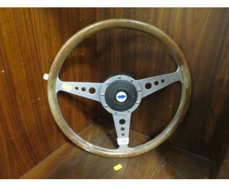 A VINTAGE FORD MOTO-LITA CAR STEERING WHEEL 