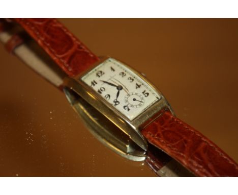 A MENS VINTAGE ART-DECO WRISTWATCH BY GIRARD PEREGAUX IN 10 CARAT GOLD FILLED CASE