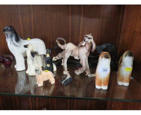 A COLLECTION OF CERAMIC DOG FIGURES ETC. TO INCLUDE RUSSIAN AFGHAN HOUNDS' POOLE EXAMPLE ETC. (9)