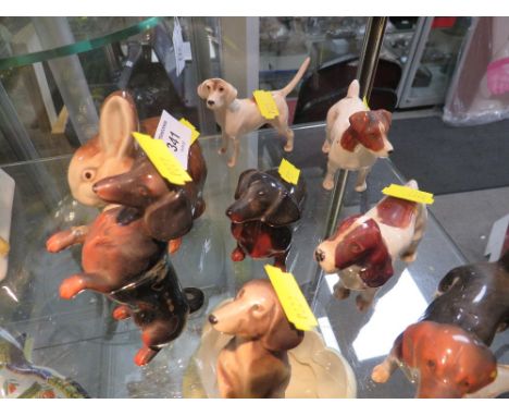 A COLLECTION OF BESWICK DOG FIGURES' POOLE RABBIT FIGURE ETC (12) 