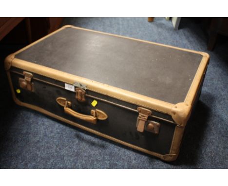 A VINTAGE BANDED SUITCASE
