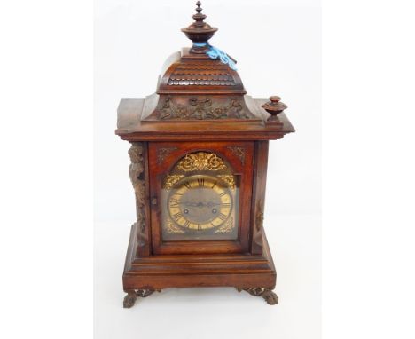 Victorian mahogany mantel clock in basket-top case with broken arch dial, eight-day striking movement 