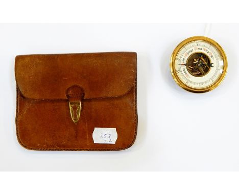 Small brass aneroid hand-held barometer with screw fitting, "Clifton" hide cheroot holder and a vintage stained mahogany-effe