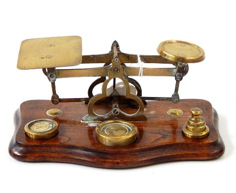 Set 19th century brass gold scales with eight weights, in mahogany case and pair brass and oak letter scales with five weight
