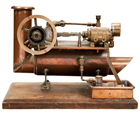 AN ENGINEERED HORIZONTAL STEAM ENGINE AND BOILER&nbsp;in copper, brass and steel with circular boiler firing aperture, water 