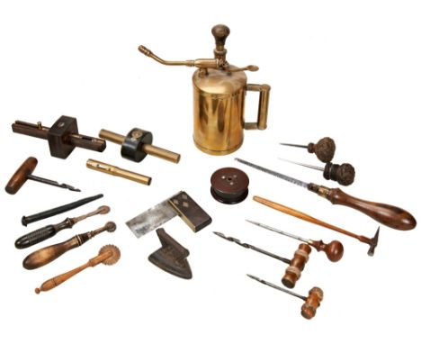 A VICTORIAN AWL WITH PLAITED ROPE GRIP&nbsp;another similar, an ebony and brass scribe marking gauge by W. Marpease, another 