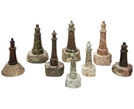 A SERPENTINE LIGHTHOUSE and seven others of various sizes, and a serpentine lamp lidPROVENANCE: The David Stainthorpe Collect