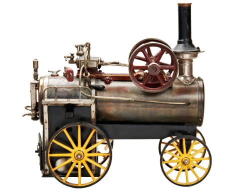 A STEAM TOY TRACTION FARM ENGINE&nbsp;probably German and dating from the mid-20th century, some repainting and losses. 29 cm