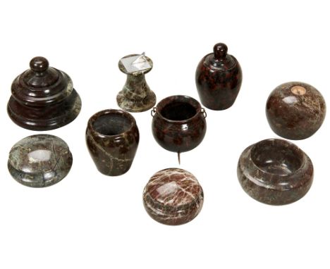 A SERPENTINE CAULDRON&nbsp;with three metal legs and swing handle, a serpentine pedestal sun dial, a paper weight inset with 