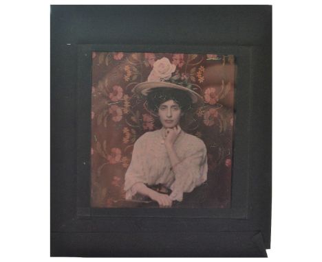 AN AUTOCHROME LUMIÉRE GLASS PLATE PHOTOGRAPHIC PORTRAIT OF A WOMAN IN A FLORALLY ADORNED HAT C1910&nbsp;and two Autochrome po