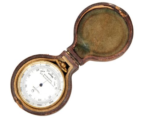 A POCKET BAROMETER C1900&nbsp;the gilt case with swing loop the face with retailers mark for ‘Husbands 8 St. Augustines Parad