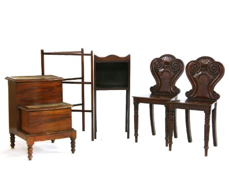 A pair of early Victorian hall chairs, a Victorian mahogany three step commode, a Georgian mahogany pot cupboard, and a mahog