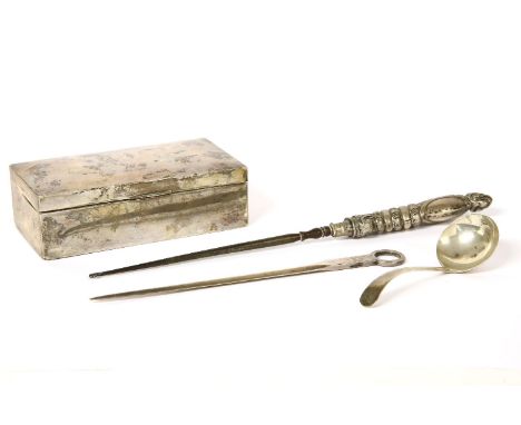 A Victorian silver skewer, marks for London 1855, Chawner &amp; Co, a silver cigarette box, a button hook, and a sauce ladle 