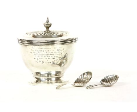 A silver tea caddy by Charles &amp; Richard Comyns, London, 1924, together with two silver tea caddy spoons (3)