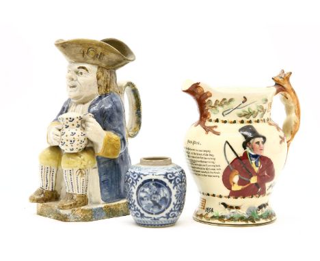 A late 18th/early 19th century Ralph Wood type pearlware toby jug, with sponged decoration to back and foaming ale jug, toget