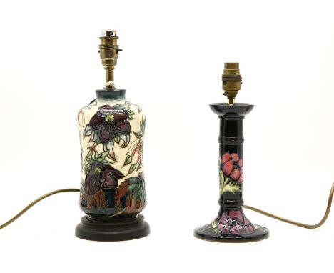 Two Moorcroft lamp bases, one of waisted form, 33cm high, the other of candlestick form, 29cm high
