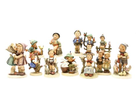 A collection of twelve Goebel Hummel figures, to include 'Wayside Harmony' and similar