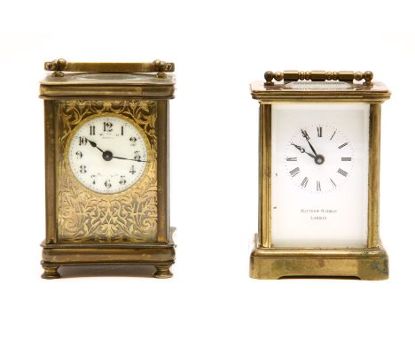 A late 19th century brass carriage clock, with white enamel dial and Arabic numerals, 12.5cm high, together with one other ca