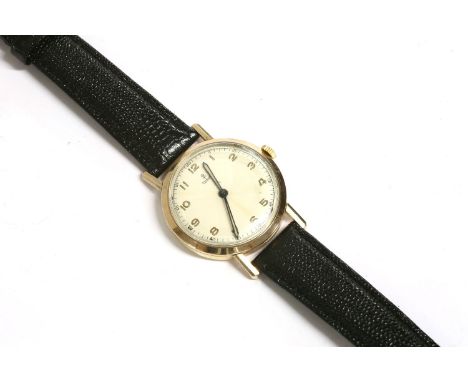 A gentlemen's 9ct gold Tudor Rolex manual wind wristwatch