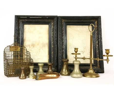 A set of brass bell weights bronze, copper shot flash, brass letter rack, brass student's double candlestick and a pair of pl