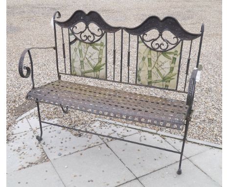 A Folding iron bench, with lattice back