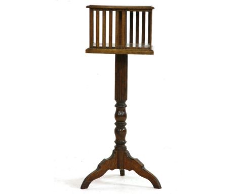 An oak revolving bookcase, on a tripod base, made up, 97cm high