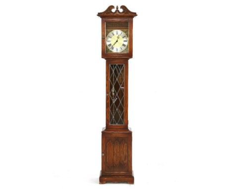 An Old Charm oak longcase clock, with three weights, 202cm