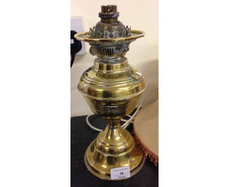 A brass oil lamp & shade converted to electricity.