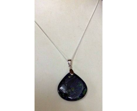 Blue & green polished stone pendant on a silver chain.